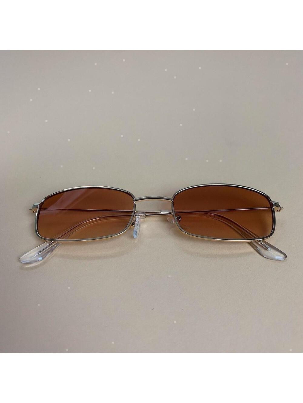 Brown and gold slim sunglasses. Brown trim with brown lenses. Glasses are - Picture 4 of 6